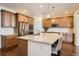 Spacious kitchen featuring granite counters, stainless steel appliances and wood cabinets for a modern touch at 25561 E 5Th Pl, Aurora, CO 80018