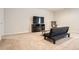 Spacious living room with plush carpet, TV, and comfortable seating at 25561 E 5Th Pl, Aurora, CO 80018