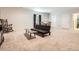 Living room showcasing seating with a sofa and a wood coffee table at 25561 E 5Th Pl, Aurora, CO 80018
