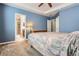 Primary bedroom with tray ceiling leads to ensuite bath at 25561 E 5Th Pl, Aurora, CO 80018