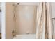Full shower and tub with tile surround and updated fixtures at 25561 E 5Th Pl, Aurora, CO 80018