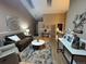 A stylish living room with hardwood floors and plenty of natural light at 6887 S Dover Way, Littleton, CO 80128