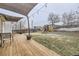 Large backyard with playset, deck, and shade structure at 1840 Rowena St, Thornton, CO 80229