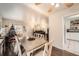 Dining room with table, chairs, and view of kitchen at 1840 Rowena St, Thornton, CO 80229