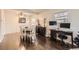 Dining area with table, chairs and hardwood floors at 1840 Rowena St, Thornton, CO 80229