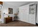 Bedroom features a built-in Murphy bed for flexible living and efficient space at 4899 S Dudley St # 3A, Littleton, CO 80123