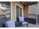 Cozy patio with outdoor seating and storage, perfect for relaxing outside at 4899 S Dudley St # 3A, Littleton, CO 80123