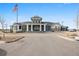 Community clubhouse featuring craftsman-style architecture and inviting entrance at 6956 S Titus St, Aurora, CO 80016