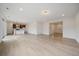 Spacious living room features an open floor plan, and easy access to the kitchen and entryway at 26789 E Cedar Ave, Aurora, CO 80018