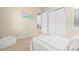 Comfortable bedroom with soft carpet, closet, and natural light at 17720 W 94Th Dr, Arvada, CO 80007
