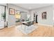 Dining area with sliding glass doors leading to a back patio seating area at 17720 W 94Th Dr, Arvada, CO 80007