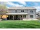 Relaxing outdoor patio, perfect for entertaining, with a large, grassy backyard at 9325 Lark Sparrow Dr, Highlands Ranch, CO 80126
