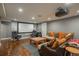 Finished basement featuring a home theater with a large screen and comfortable seating at 9325 Lark Sparrow Dr, Highlands Ranch, CO 80126