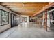 Unfinished basement with exposed ceilings and a concrete floor at 1711 Spring Water Ln, Highlands Ranch, CO 80129