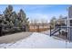 Back deck with metal railings and an expansive view of the backyard at 1711 Spring Water Ln, Highlands Ranch, CO 80129