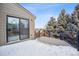 The back deck features metal railings and ample space for outdoor entertaining at 1711 Spring Water Ln, Highlands Ranch, CO 80129