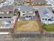 Aerial view showcasing the home's backyard and surrounding neighborhood at 2521 E 163Rd Pl, Thornton, CO 80602