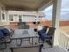 Relaxing backyard deck features seating and a grill at 2521 E 163Rd Pl, Thornton, CO 80602