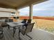 Spacious backyard deck with seating area and built-in grill at 2521 E 163Rd Pl, Thornton, CO 80602
