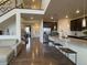 Open concept kitchen with granite countertops, island, and stainless steel appliances at 2521 E 163Rd Pl, Thornton, CO 80602
