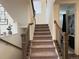 Indoor stairs leading to the upper level at 2521 E 163Rd Pl, Thornton, CO 80602