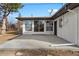 Concrete patio and white brick building at 365 S Xapary St, Aurora, CO 80012