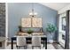 Dining room with contemporary lighting and decor at 1159 S Otis Pl, Lakewood, CO 80232