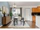 Bright dining room with stylish furniture and modern decor at 1159 S Otis Pl, Lakewood, CO 80232