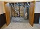Basement utility room with exposed pipes and plumbing fixtures at 2832 S Mobile St, Aurora, CO 80013
