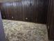 Unfinished basement with paneled walls awaits your personal touch and creative design ideas at 2832 S Mobile St, Aurora, CO 80013