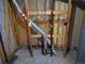 Basement showing water and pipe connections, utilities, and construction detail at 2832 S Mobile St, Aurora, CO 80013