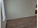 Open living room features modern flooring and natural lighting at 2832 S Mobile St, Aurora, CO 80013