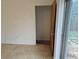 Room with tiled floor showing access to backyard at 2832 S Mobile St, Aurora, CO 80013