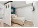Bright bedroom features a comfortable bed, natural light, and a modern design, perfect for relaxation at 120 W Bayaud Ave, Denver, CO 80223