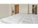 A bright bedroom with a closet, an ensuite, and natural light at 10645 Moore Ct, Broomfield, CO 80020