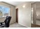 This bedroom offers great natural light from its large window and easy access to the ensuite bathroom at 10645 Moore Ct, Broomfield, CO 80020