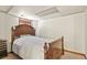 Bedroom featuring a classic wood bed frame and soft natural lighting at 10645 Moore Ct, Broomfield, CO 80020