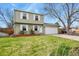 Charming two-story home featuring a well-maintained front lawn, a two car garage and classic curb appeal at 10645 Moore Ct, Broomfield, CO 80020