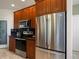 Kitchen area featuring stainless steel appliances, granite countertops, and ample cabinet space at 3519 Zane Gray Loop, Parker, CO 80138