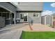 Backyard featuring a concrete patio and grassy area, perfect for outdoor enjoyment at 6307 Monterey Pl, Highlands Ranch, CO 80130