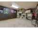 Finished basement featuring carpet and lots of shelving space at 6307 Monterey Pl, Highlands Ranch, CO 80130