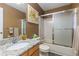 Bathroom featuring a shower over tub, granite countertops, and neutral color scheme at 6307 Monterey Pl, Highlands Ranch, CO 80130
