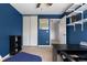Bedroom featuring a ceiling fan, carpet and walk in closet at 6307 Monterey Pl, Highlands Ranch, CO 80130