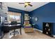 Bedroom featuring a ceiling fan, window and neutral carpet at 6307 Monterey Pl, Highlands Ranch, CO 80130