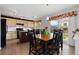 Lovely kitchen with an island and plenty of natural light from the sliding door to the backyard at 6307 Monterey Pl, Highlands Ranch, CO 80130