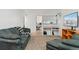 Comfortable basement living area with sofa, TV, and desk, designed for versatile living at 3100 W 94Th Ave, Westminster, CO 80031