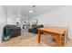 Spacious basement with seating area, desk, and table, offering versatility for living and work at 3100 W 94Th Ave, Westminster, CO 80031