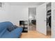 A basement bedroom with a view into the living area with door to closet and storage at 3100 W 94Th Ave, Westminster, CO 80031