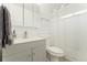Bathroom featuring a modern vanity, brushed nickel faucet, and shower with a white curtain at 3100 W 94Th Ave, Westminster, CO 80031