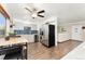 Well-appointed kitchen featuring modern appliances, light gray cabinets, and an adjacent dining area with natural light at 3100 W 94Th Ave, Westminster, CO 80031